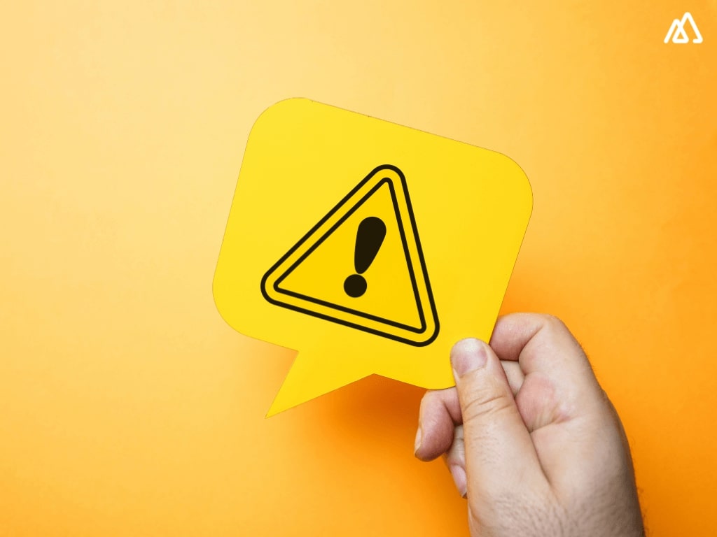 person with warning sign