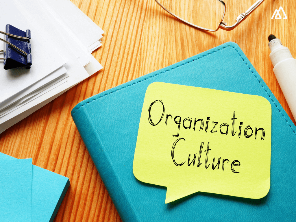 organization culture written on a yellow post it