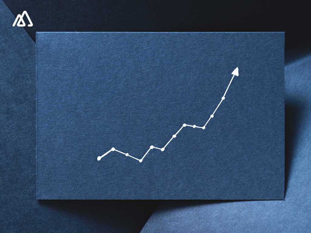 An upward graph of sales moving up