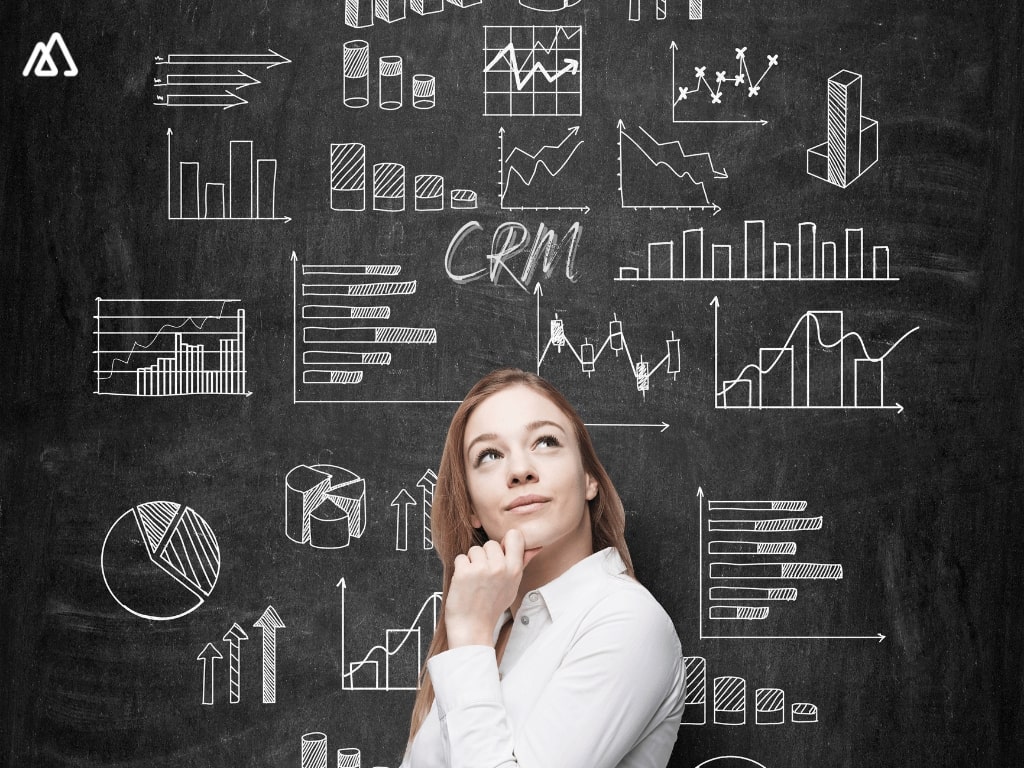 woman standing in front of CRM data